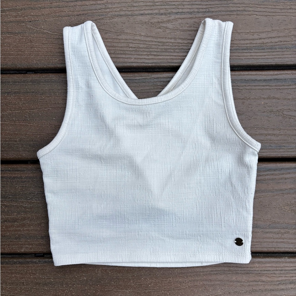 ROXY cropped tank with open back. Worn once. No stains or tears.